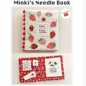 May include: A fabric needle book titled Minki's Needle Book. The cover is white with red strawberries and a central label reading Every stitch is done with LOVE. The interior is red with white flowers, featuring pockets and embroidered labels.