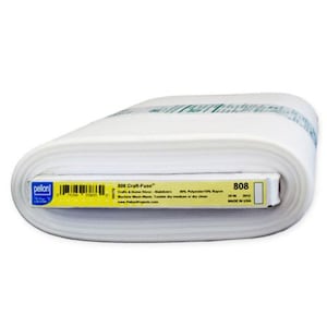 May include: A roll of white Pellon 808 Craft-Fuse stabilizer featuring a yellow label with black text. The label displays the product name, a barcode, 90% polyester and 10% rayon composition, care instructions, and the 20 inch width measurement.