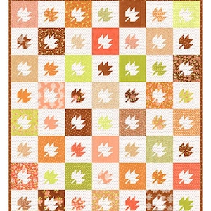 May include: A quilting pattern featuring a checkerboard design with autumn leaves in shades of orange, brown, green, and white. The pattern is labeled "Leaf Checkerboard" and is "Fat 1/8th Friendly". The pattern is by Fig Tree & Co. by Joanna Figueroa.
