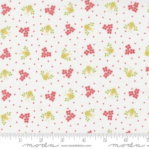 May include: White fabric with a repeating pattern of small red flowers, yellow bees with green leaves, and tiny red dots.