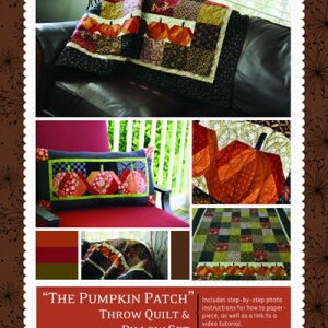 May include: A Kimberbell The Pumpkin Patch throw quilt and pillow set featuring orange pumpkin motifs on patchwork fabric. The quilt measures 70 x 58 inches and the pillow measures 12 x 24 inches. The set includes step-by-step photo instructions.