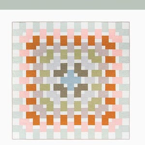 May include: A quilt pattern called "Geo Weaver Quilt" featuring a geometric design with a variety of colors, including pink, orange, green, gray, and blue. The pattern is described as "A Beginner-Friendly Quilt Pattern".