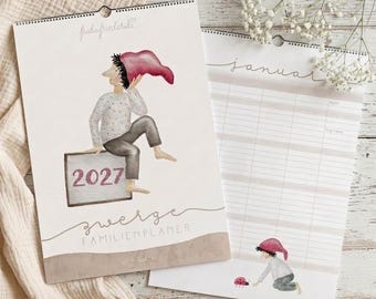 May include: A 2027 wall calendar titled Zwerge Familienplaner featuring a watercolor illustration of a figure in a red cap sitting on a sign. The interior page shows the month of Januar with grid columns and a small illustration of a figure and a ladybug.