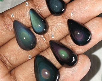 Erstklassiger Maxican Augenobsidian, Regenbogen-Obsidian-Steine Ringgröße, blauer lila grüner Obsidian, Wurzel-Chakra-Heilstein-Meditationsanhänger.