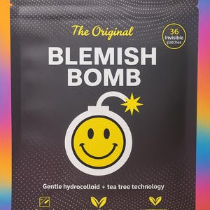 May include: A black package with the words "BLEMISH BOMB" in large white letters. The package features a yellow bomb graphic with a smiley face and a starburst. Text includes "The Original", "36 Invisible patches", and "Gentle hydrocolloid + tea tree technology".