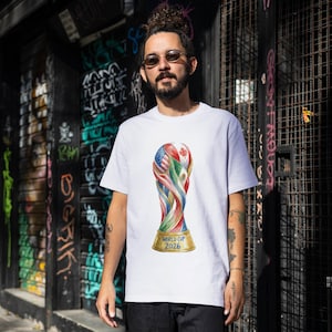 Watercolor illustration of the 2026 World Cup trophy featuring USA, Canada, and Mexico flags intertwined. High-resolution digital clipart isolated on white for sublimation and t-shirt printing.
