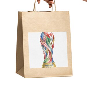 Artistic 2026 World Cup trophy print with blurred stadium background. Colorful watercolor soccer art featuring American, Canadian, and Mexican flags for football fan wall decor.