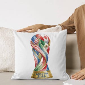 Artistic 2026 World Cup trophy print with blurred stadium background. Colorful watercolor soccer art featuring American, Canadian, and Mexican flags for football fan wall decor.
