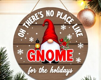 May include: Round wooden sign with a gnome design. The sign features a red-hatted gnome holding a lantern and a sprig of greenery. Text reads "OH THERE'S NO PLACE LIKE GNOME for the holidays" in white and red. Snowflakes and dots decorate the sign.