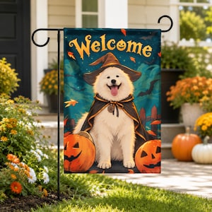 May include: A rectangular garden flag featuring a white Samoyed dog wearing a black witch hat and cape. The background is a dark blue night sky with bats and orange leaves. The word Welcome is printed in yellow at the top with two orange pumpkins.