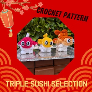 May include: Three crochet sushi figures in red, yellow, and orange, each with white and black accents. The image includes the text "CROCHET PATTERN" and "TRIPLE SUSHI SELECTION" on a red background.
