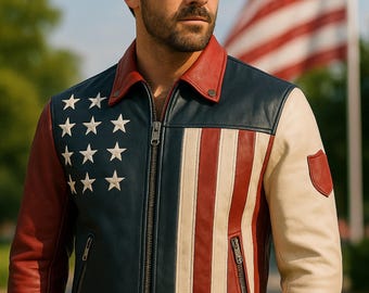 May include: A leather jacket with a patriotic design. The jacket features a navy blue upper section with white stars, red and white stripes, and a red collar. The right sleeve is cream-colored with a red shield emblem.