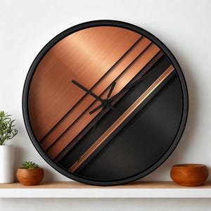 May include: A round wall clock featuring a split design with a brushed copper metallic finish on the upper left and a textured matte black surface on the lower right. The clock has a thin black frame and three black hands at the centre.