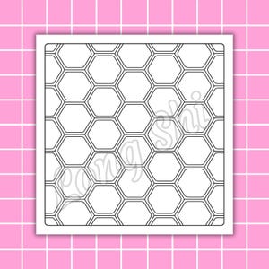 May include: A black and white honeycomb pattern design on a white square, set against a pink grid background. The design features a repeating pattern of hexagonal shapes. The image is a graphic design.