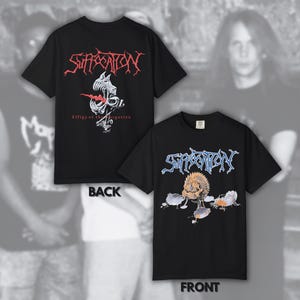 May include: Black t-shirts with graphic designs. One shirt features red text and a skull illustration with the text "Effigy of the Forgotten." The other shirt has blue text and a creature illustration. "BACK" and "FRONT" are printed on the shirts.