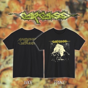 May include: Black t-shirts with the band name "Carcass" in a green, stylized font. One shirt features "Symphonies of Sickness" in yellow text on the back. The front of another shirt displays a black and white graphic.