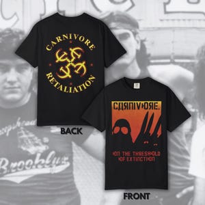 May include: Black t-shirts with front and back designs. The back of the shirt features the text "CARNIVORE RETALIATION" in yellow, with a symbol. The front of the shirt has a graphic with the text "ON THE THRESHOLD OF EXTINCTION".