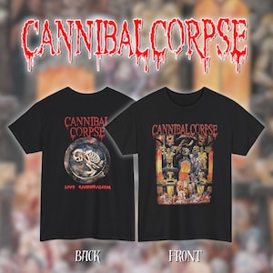Puede incluir: Camisetas negras con el nombre de la banda "CANNIBAL CORPSE" en fuente roja goteante. Una camiseta presenta un gráfico de esqueleto con el texto "LIVE CANNIBALISM". La otra camiseta muestra una ilustración detallada y colorida. Etiquetas "BACK" y "FRONT" visibles.
