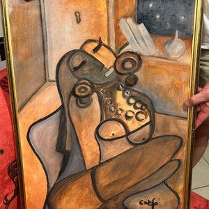 oil painting 50 x 70 cm depicting a woman on an armchair