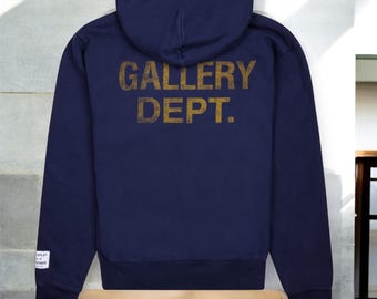 Suéter con capucha azul clásico del departamento de galería