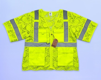 Chaleco de seguridad de encaje neón con bolsillos (clase 3), diseñado por Floyd Ruby