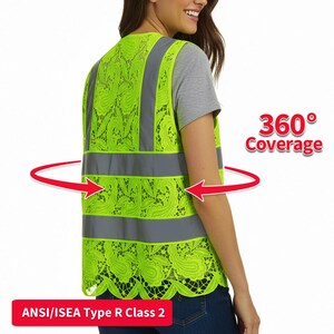 May include: A high-visibility safety vest in neon green with reflective gray stripes. The vest features a floral lace design and the text "360&deg; Coverage" and "ANSI/ISEA Type R Class 2".