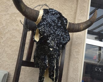 Black mosaic cow skull