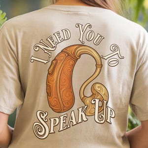 聴覚障害啓発のためのユーモアあふれるデザイン。障害者向けTシャツ、補聴器ユーザー向けグラフィック