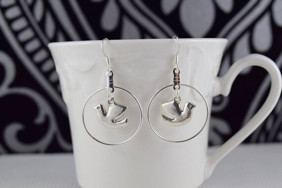 Silver dangle earrings - Casual everyday wear - Silver plated surgical steel hooks - Dove charm earrings - Free shipping to Canada