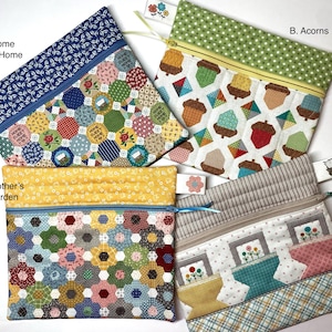 May include: Four colorful zippered pouches with different fabric patterns. The pouches are labeled A. Grandmother's Flower Garden, B. Acorns, C. Home Sweet Home, and D. Flower Baskets.