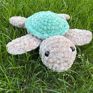 small crochet turtle made of chenille, plush, amigurumi