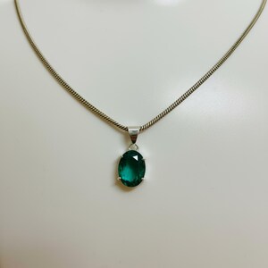 Oval Cut Emerald Pendant with Chain Included
