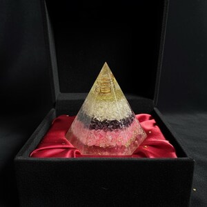 Rose quartz crystal pyramid for love, peace, and emotional healing
