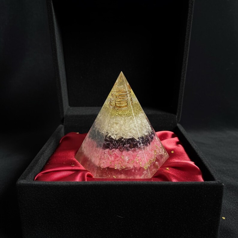 Rose quartz crystal pyramid for love, peace, and emotional healing