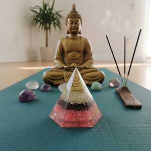 Handmade rose quartz orgone pyramid with copper coil for energy healing