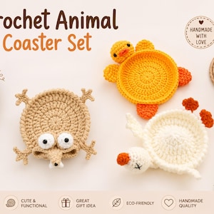 May include: A set of three handmade crochet animal coasters. The set includes a beige frog, a yellow duck with orange accents, and a white duck with orange accents. The coasters are designed to be cute and functional. The text "Crochet Animal Coaster Set" is at the top.