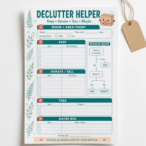 May include: A white paper decluttering checklist titled Declutter Helper with teal headers and green fern illustrations along the left side. It includes sections for Keep, Donate, Sell, Toss, and Maybe Box, plus a decision flowchart and a brown tag.