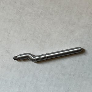 S-shaped stylus for precise typing on smartphones and touchscreens.