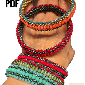 May include: Several beaded bracelets in various colors, including gold, red, teal, and orange. The bracelets are stacked on a wrist and held in a hand. The word "PDF" is in the upper left corner.