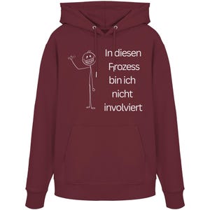 May include: A maroon hoodie with a drawstring hood and a kangaroo pocket. The front features a stick figure waving and the German text "In diesen Prozess bin ich nicht involviert" in white.