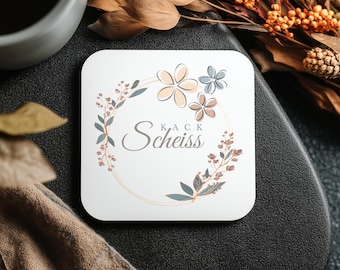 Cork coasters/beer mats with a funny "poop" design as a gift or for yourself as a statement piece.