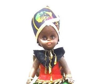 African American doll dressed in African print