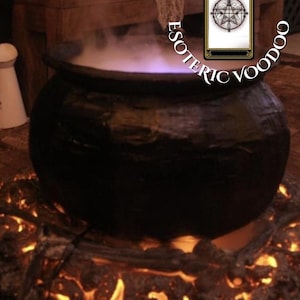 May include: A large, black cauldron with purple vapour rising from within, set over a glowing, fiery base. A tarot card with a star design is visible. The text "ESOTERIC VOODOO" is arched above the cauldron. The scene evokes a mystical or occult theme.