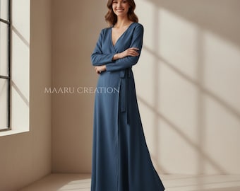 May include: A long, flowing, blue dress with a wrap-style design and a matching belt. The dress has long sleeves and a V-neckline. The text "MAARU CREATION" is visible on the dress.