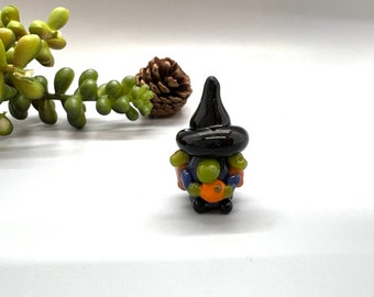 Tiny Glass Witch Gnome Figurine- Holding Pumpkin- Purple Dress and Green Nose