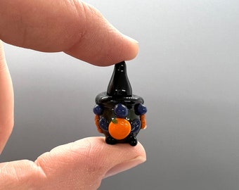 Tiny Glass Witch Gnome Figurine- Holding Pumpkin- Green Dress and Purple Nose