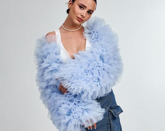 Volangbolero, Burleskkostym, Drag queen-kostym, Vegas showgirl-kostymer, Brudkavaj, Möhippa-kostym, Sångerska-scenkostym