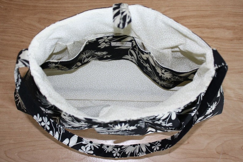 black and cream purse