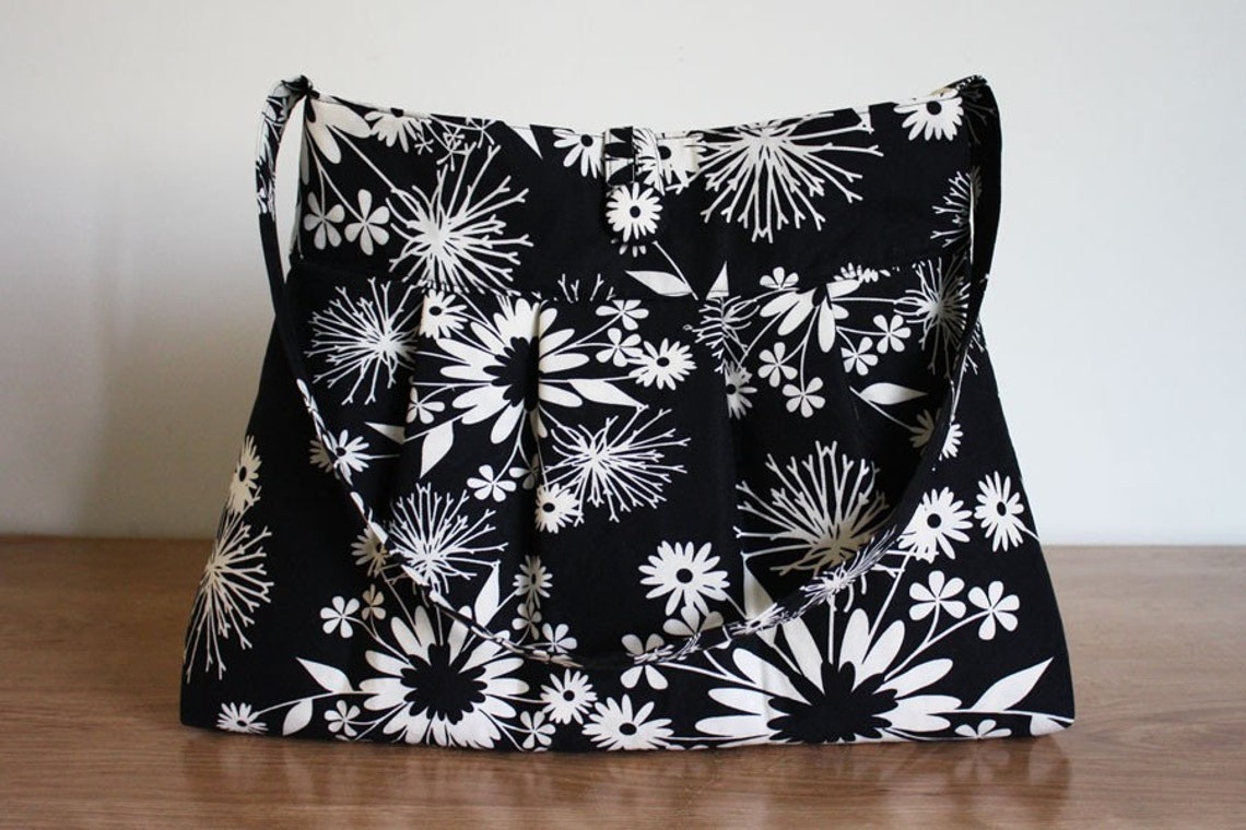 black and cream purse