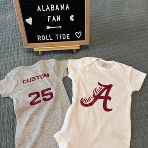 Tennessee Vs Alabama Rivalry Baby Onesie - "In My Diaper I Have A..." Sports Fan Bodysuit